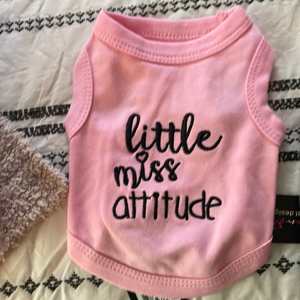 Size small pet clothes. New with tags